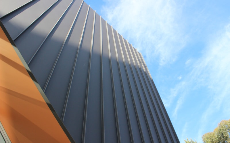 Metal Roofing vs Shingle: Insurance Cost Differences for Contractors